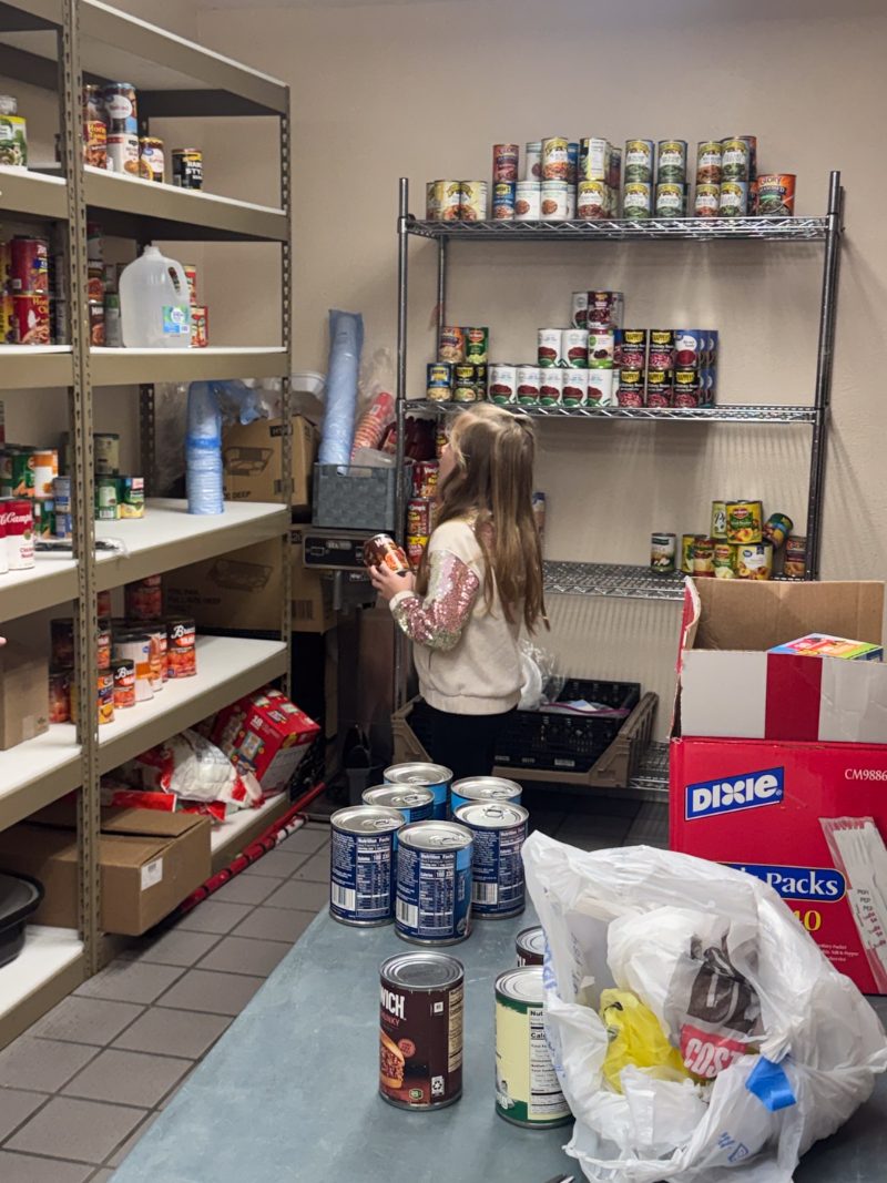 Shelves of supplies prepared for families in crisis